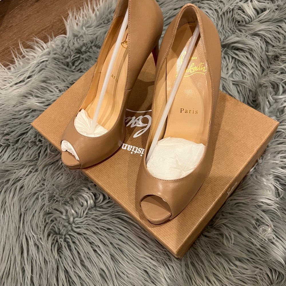 Christian Loubitins peep toes! Never worn! In mint condition!